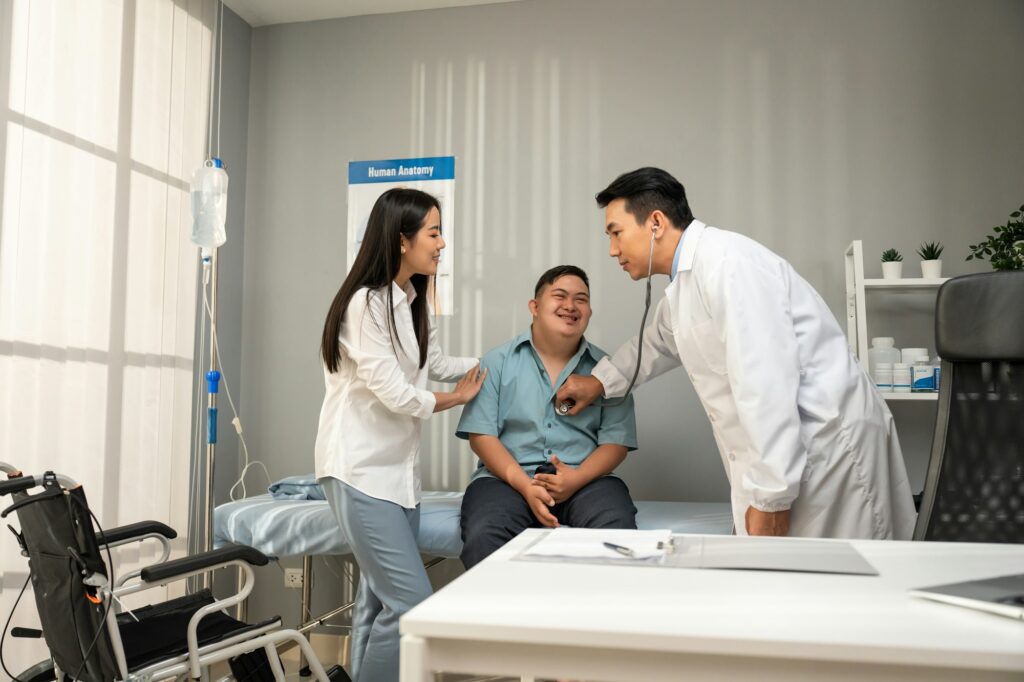 Asian young man and mother visit and consult health problem with doctor.
